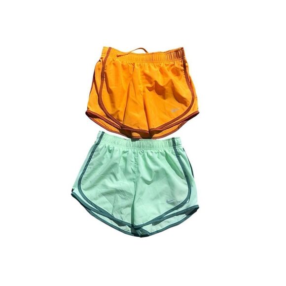 2 Nike woman’s XS Dri-Fit Running Run Shorts orange green hiking outdoors New - Picture 1 of 3